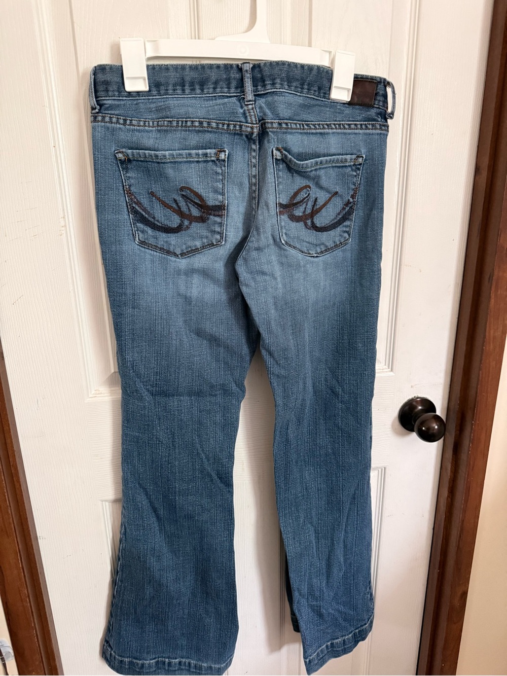 Express Light Blue Denim Flare Jeans with Embroidered Back Pockets